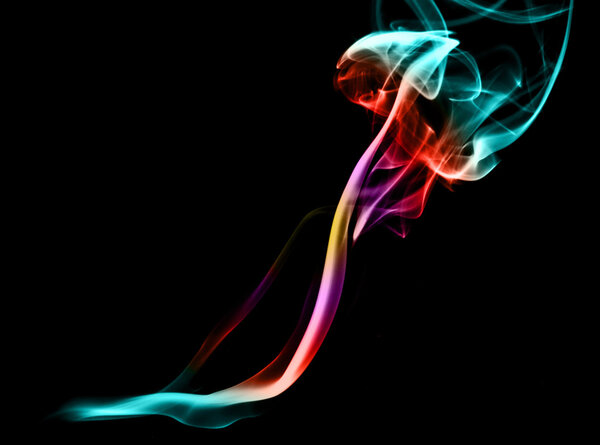 Colorful magic abstract fume curves over black background