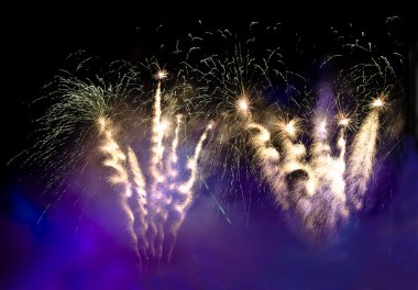 Fireworks in the lilac smoke clipart