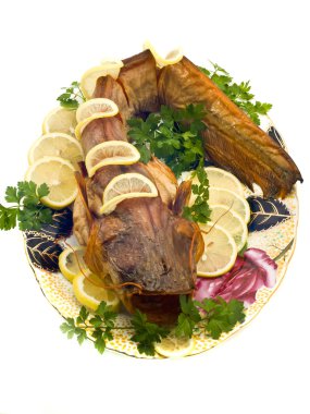 Bloated fresh-water catfish with lemon clipart