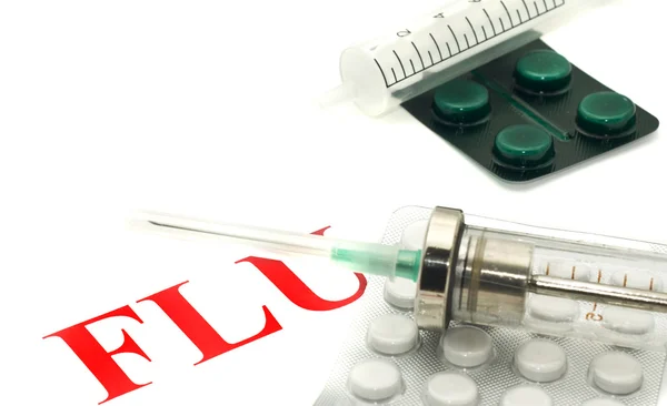Advertencia FLU H1N1 - comprimidos y jeringa — Foto de Stock