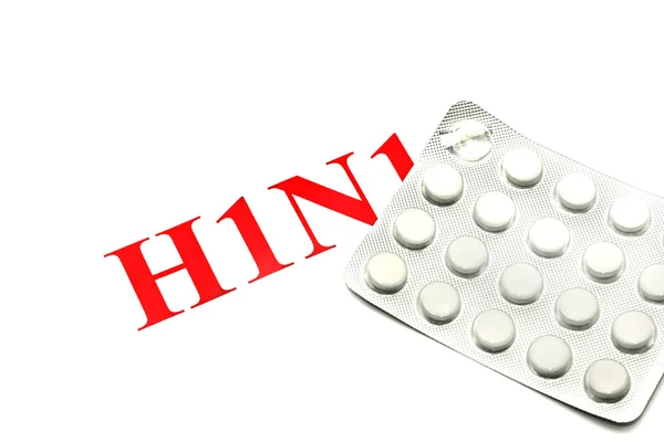 Swine FLU - крупный план белых таблеток — стоковое фото