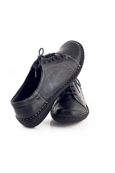 Paar zwart lederen schoenen voor vrouwen — Stockfoto