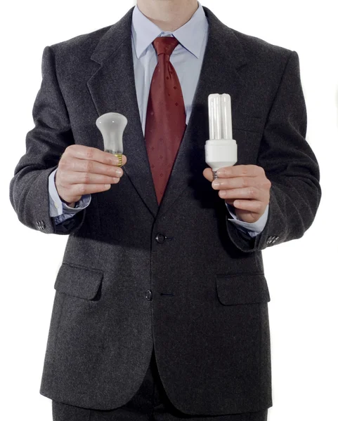 Бизнесмен с лампочками — стоковое фото