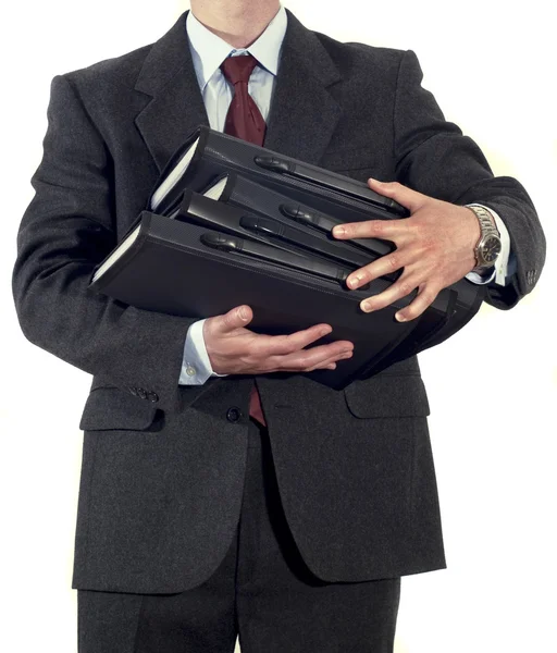Businessman with stack of folders — Stock Photo, Image