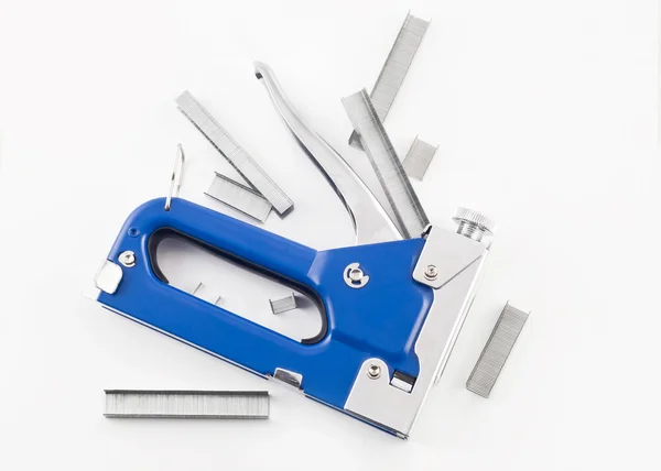 Blue staple gun with staples isolated — Stock Photo, Image