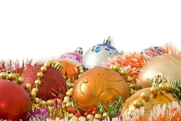 Karácsonyi dekoráció - színes baubles üdvözlés — Stock Fotó