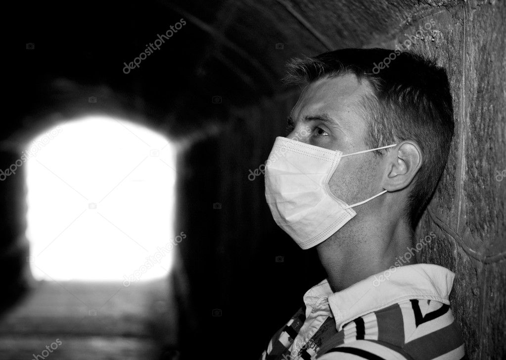 Male with Gauze bandage in dark tunnel