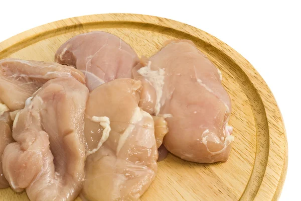 Close-up of Chicken fillet and on hardboard — Stock Photo, Image