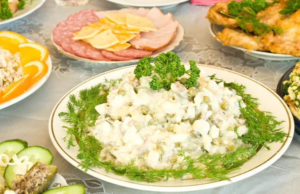 stock image Banquet in the restaurant - Russian salad