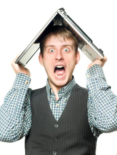 Homem chocado com laptop sobre sua cabeça — Fotografia de Stock