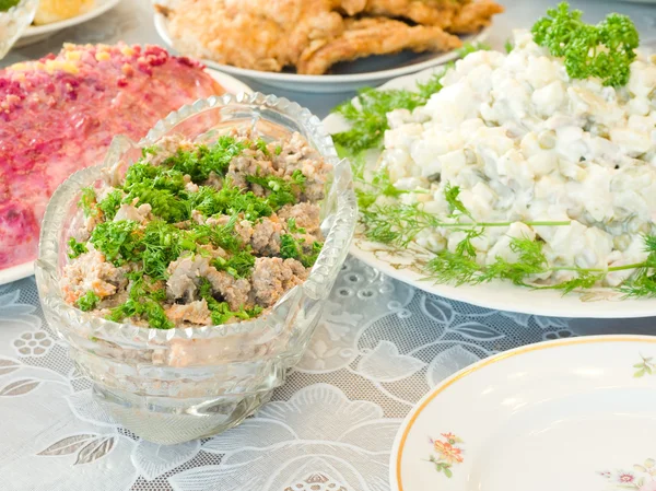 stock image Tasty liver salad on Banquet table