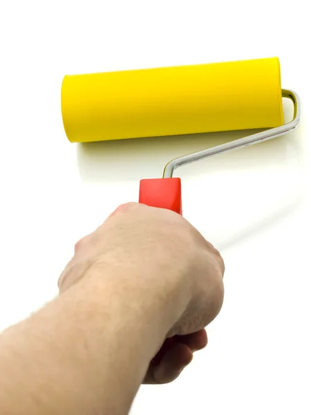 Yellow Roller for renovation in hand — Stock Photo, Image