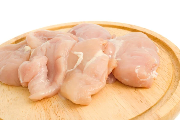 Primo piano del filetto di pollo su pannelli rigidi isolati — Foto Stock