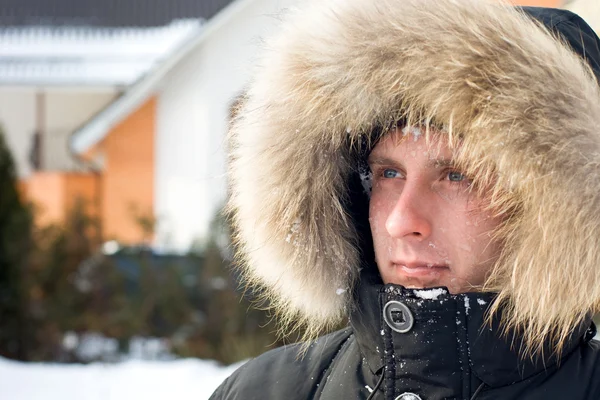 stock image Snowball fight - man in warm jacket