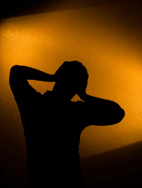 Депрессия и боль - силуэт человека — стоковое фото