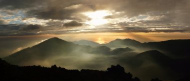 Mysterious sunrise over Haleakala crater clipart