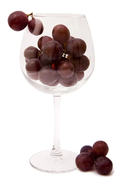 Hrozny ve sklenici na víno — Stock fotografie