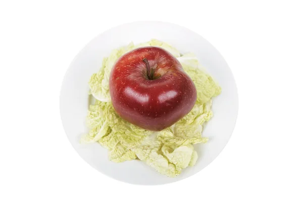 Apple on a plate — Stock Photo, Image