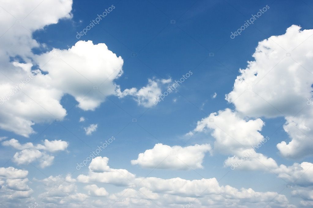 The dark blue summer sky with clouds
