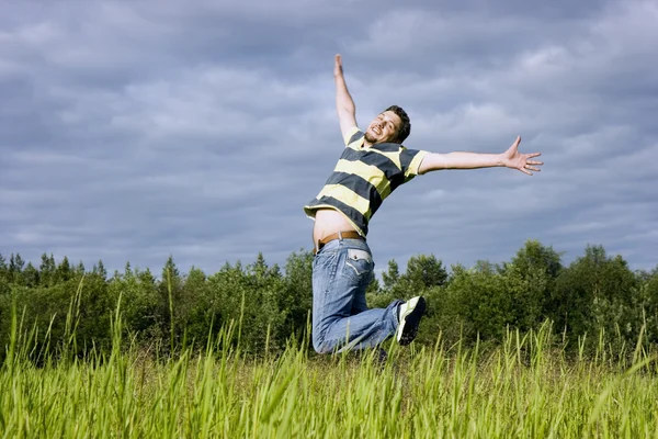 Jumps on a grass — Stock Photo, Image