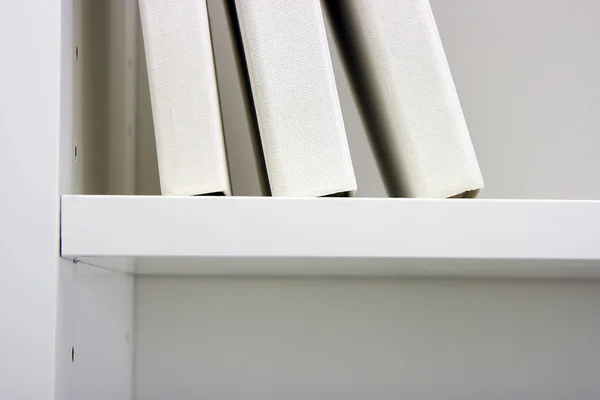 stock image Books on a regiment