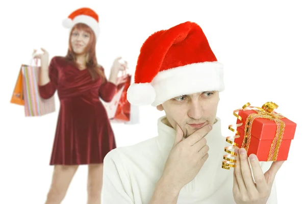The thoughtful man with gift in hand — Stock Photo, Image