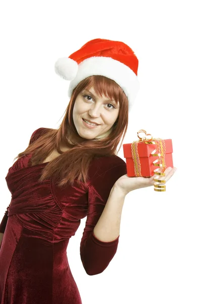 A nő kezében karácsonyi ajándék — Stock Fotó