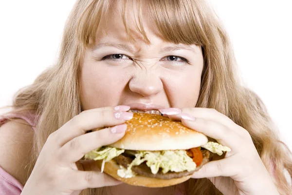 Die junge Frau und der Hamburger — Stockfoto