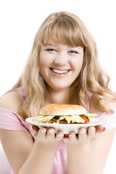The young girl with a hamburger — Stock Photo, Image