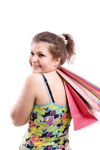 The happy young woman with purchases — Stock Photo, Image