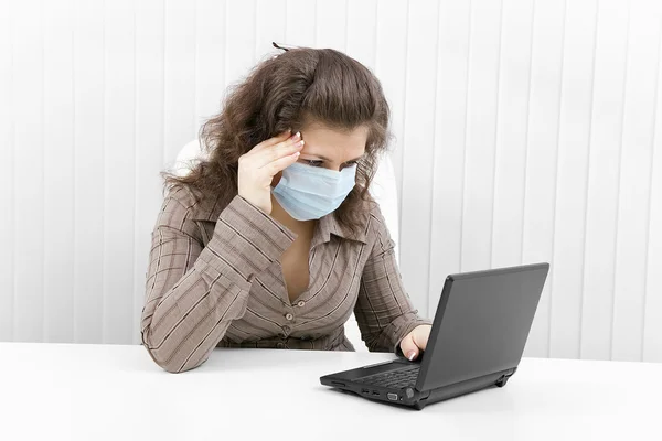 The young woman in medical mask Stock Picture