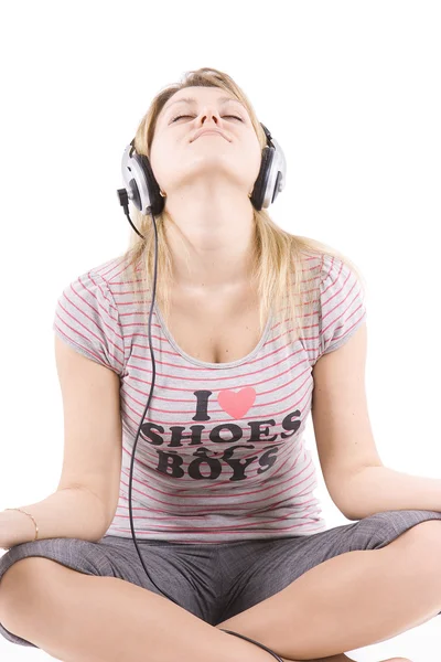 The girl listens to music — Stock Photo, Image