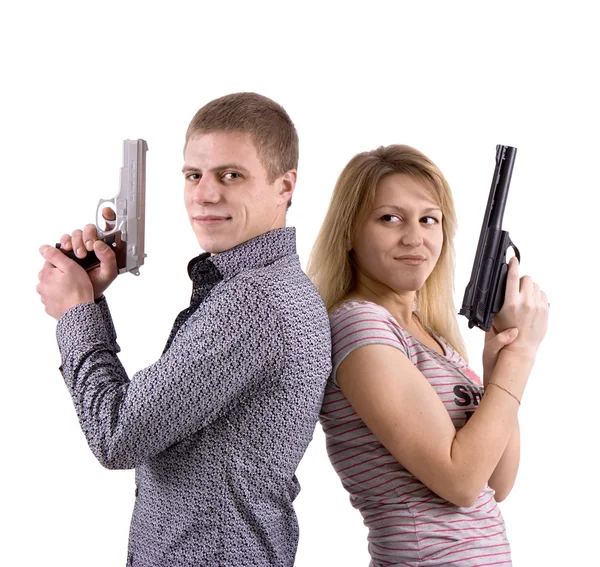 Mężczyzna i kobieta z broni — Zdjęcie stockowe