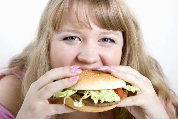 stock image The young woman and hamburger