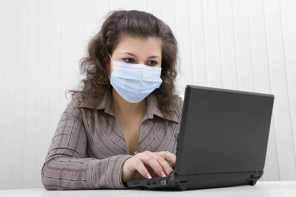 The young woman in medical mask Stock Image