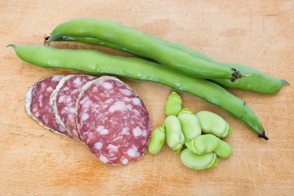 Stock image Salami slices and fava bean