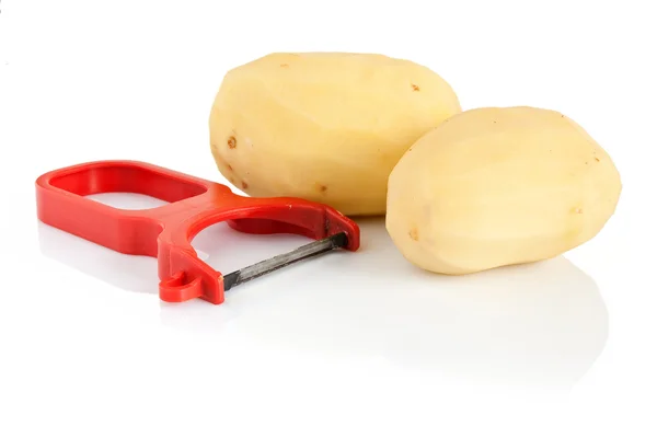 Éplucheur de pommes de terre aux pommes de terre — Photo