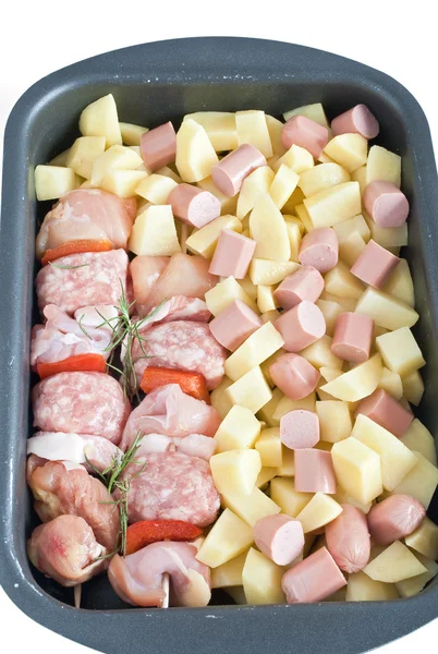 Saucepan with kebab and potatoes — Stock Photo, Image