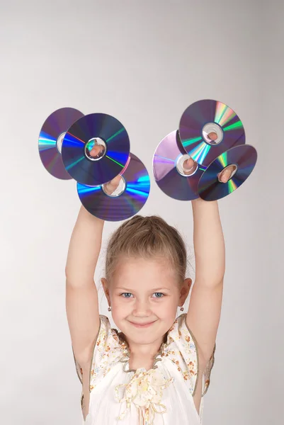Dziewczyna trzyma cd — Zdjęcie stockowe