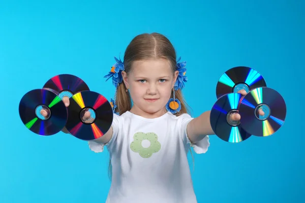 The girl holds 6 CD — Stock Photo, Image