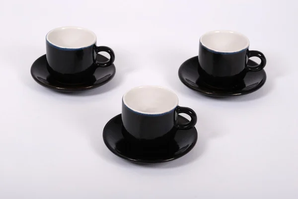 Drei schwarze Tassen — Stockfoto