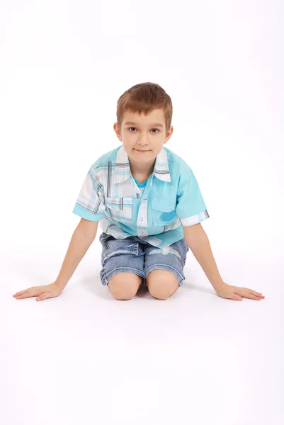 The boy poses — Stock Photo, Image