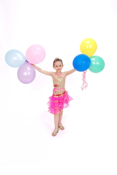 Girl holds balloons — Stock Photo, Image