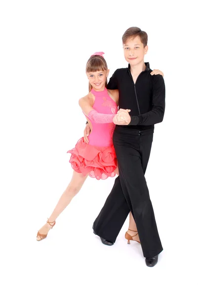 Pojke och flicka dansa ballroom dance — Stockfoto