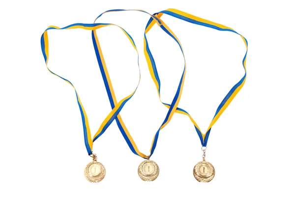 Gouden medailles geïsoleerd op witte achtergrond — Stockfoto