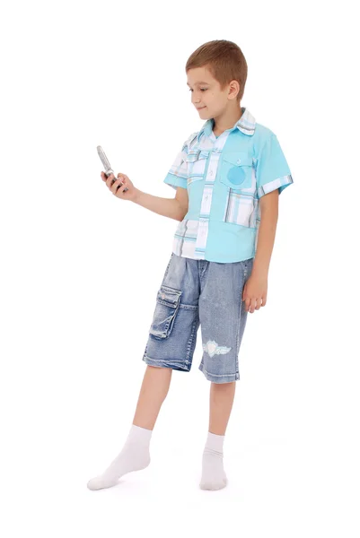 Młody chłopak wysłać SMS z telefonu — Zdjęcie stockowe