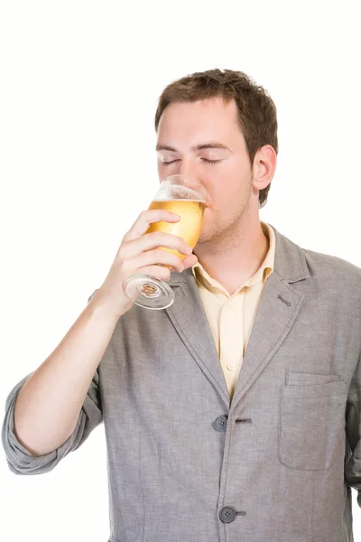 Young man drinking beer — Stock Photo, Image