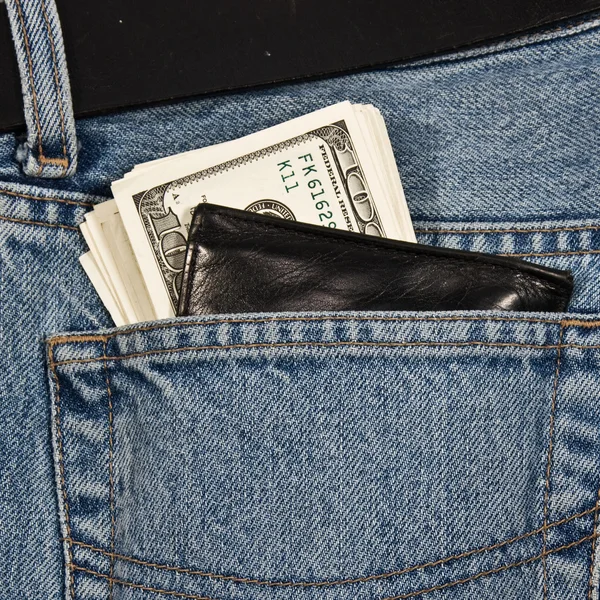 Geldbörse mit Geld in Jeans — Stockfoto