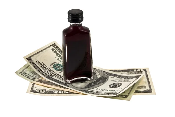 Dollars and full bottle. — Stock Photo, Image