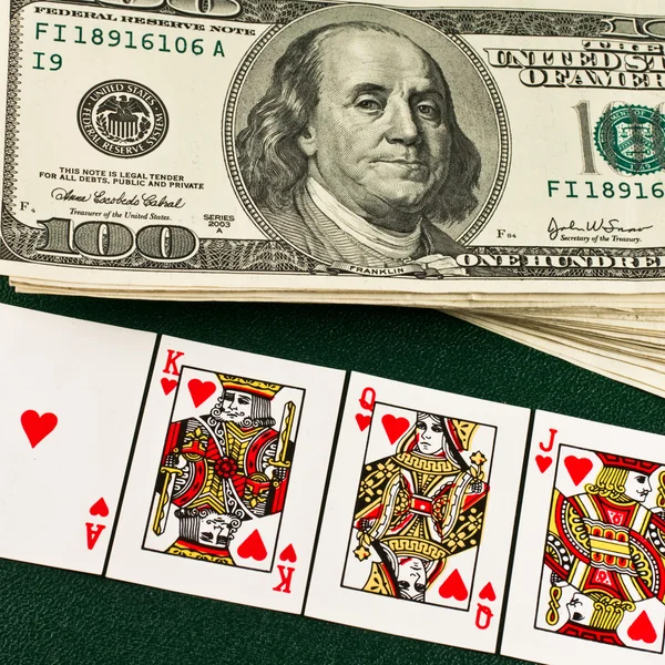 Dollari e carte da gioco — Foto Stock